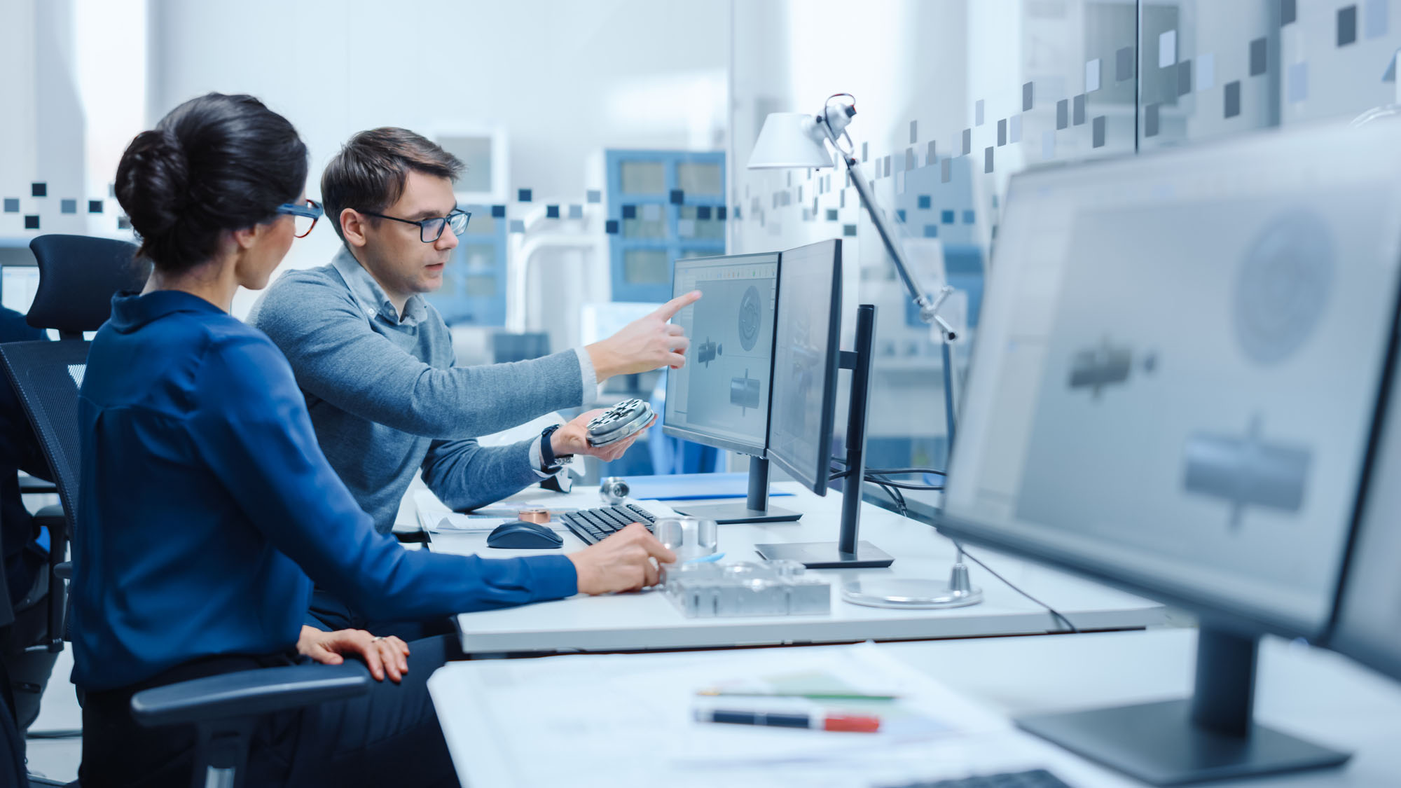 Modern Factory: Male Industrial Engineer Explains to Female Proj
